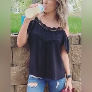 Decree Black Ruffled Sleeveless Blouse